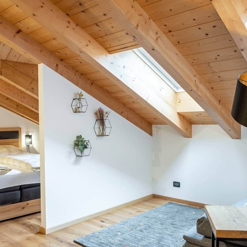 The bedroom is separated with y half-wall