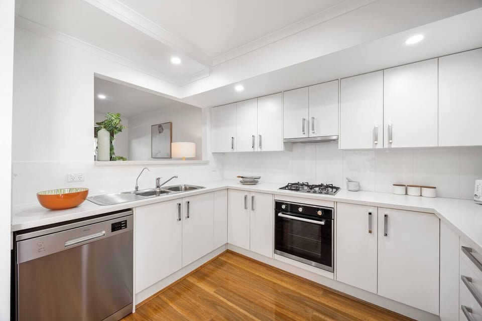 Cook with ease in the modern kitchen, where quality appliances and thoughtful essentials set the scene for everything from quick meals to shared dinners.