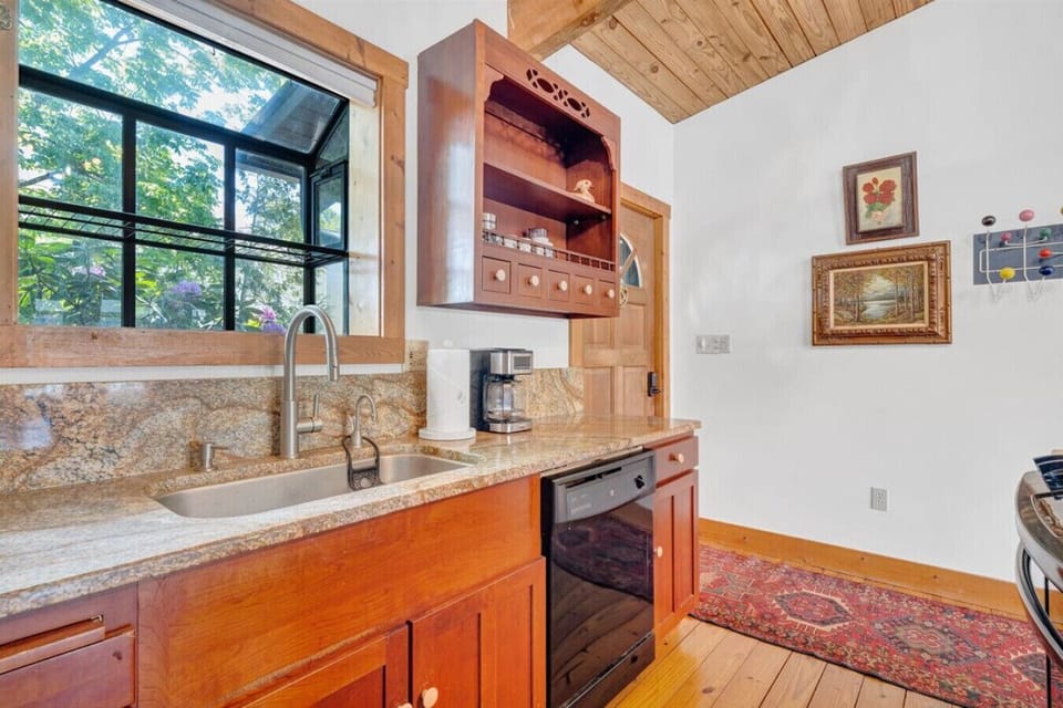 Put your culinary skills to the test in the beautiful kitchen with granite countertops & gas stove.