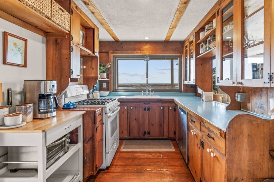 Fully-equipped kitchen with all the utensils and appliances you might need to enjoy a nice meal at home.  We provide coffee for the coffee maker!