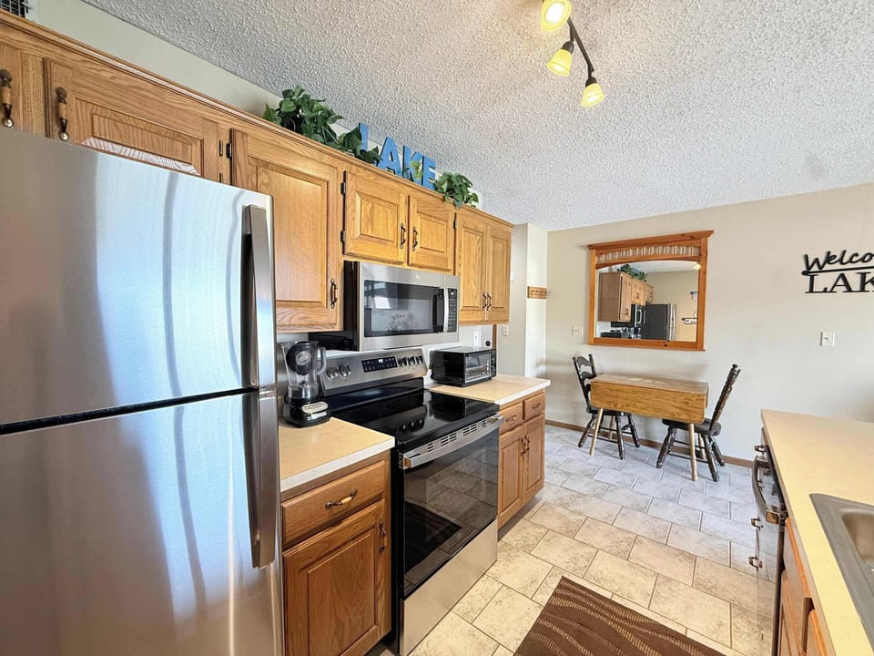 The open kitchen offers ample space & all the comforts of home​