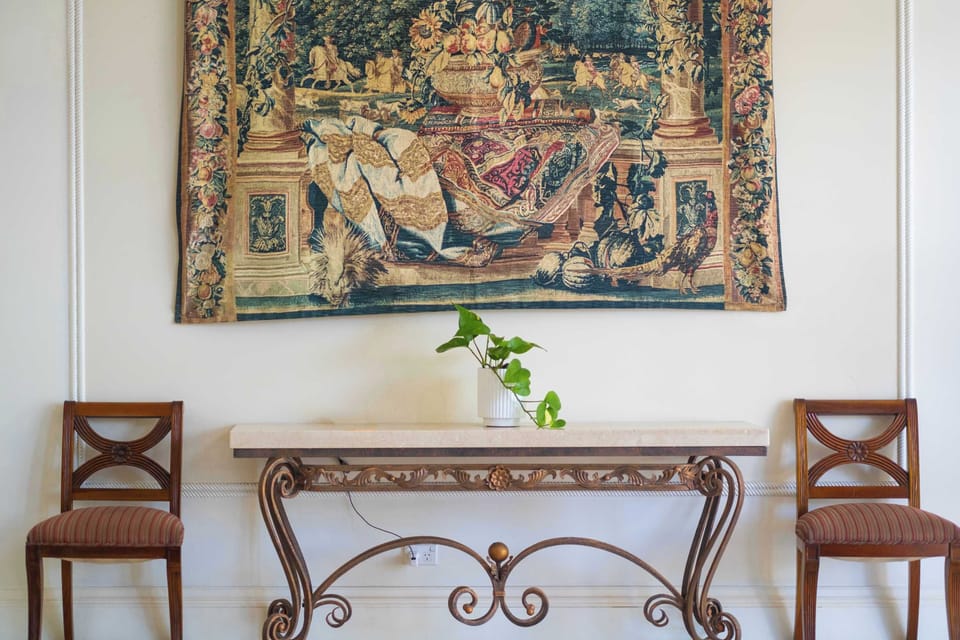 Timeless interiors with elegant furniture and artistic touches.