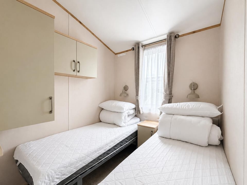 The second twin room is perfect for travelling with Granny and Grandad. They will love being able to retreat to their own space after a busy day with the family. The twin rooms feature a wardrobe so you can unpack and feel at home.