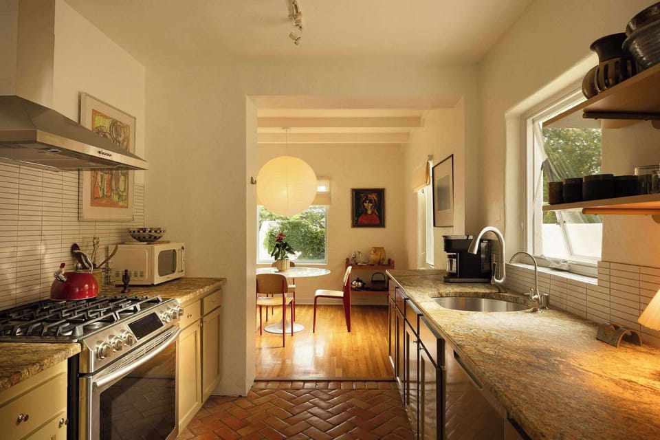 A warm, thoughtfully designed kitchen where historic charm meets everyday elegance.
