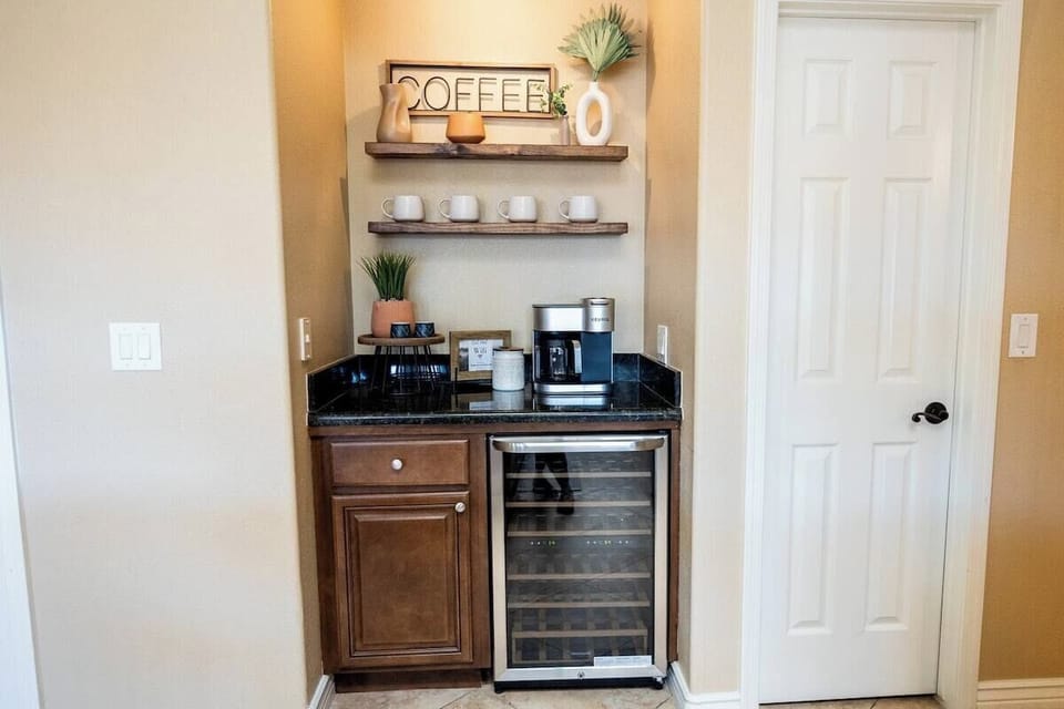 Coffee area with a wine fridge for your stay.

