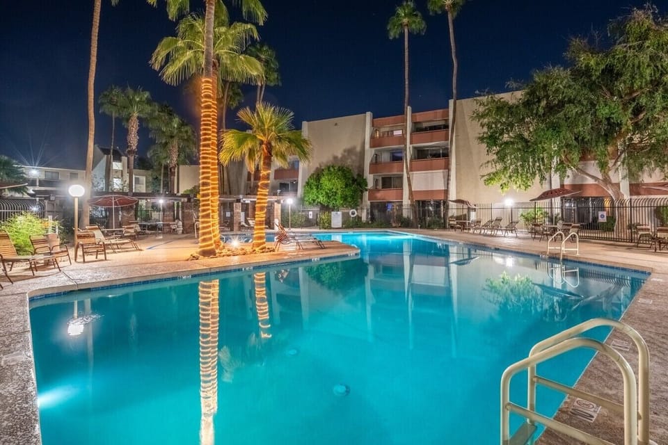 The heated pool and spa glow well into the evening.
