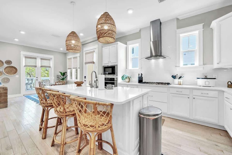 Enjoy cooking with family in the gourmet kitchen + additional island seating.