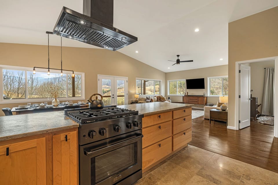 Gas stove, plenty of cookware, baking items, spices, grilling rubs, and more.