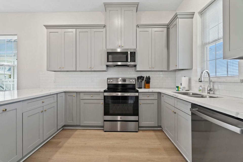 Modern kitchen with plenty of space to cook and gather.