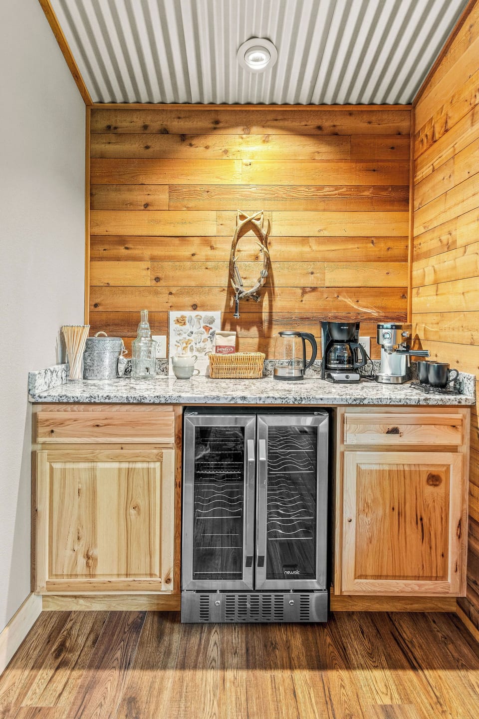 Beverage bar, wine/beer fridge, coffee/tea station. 