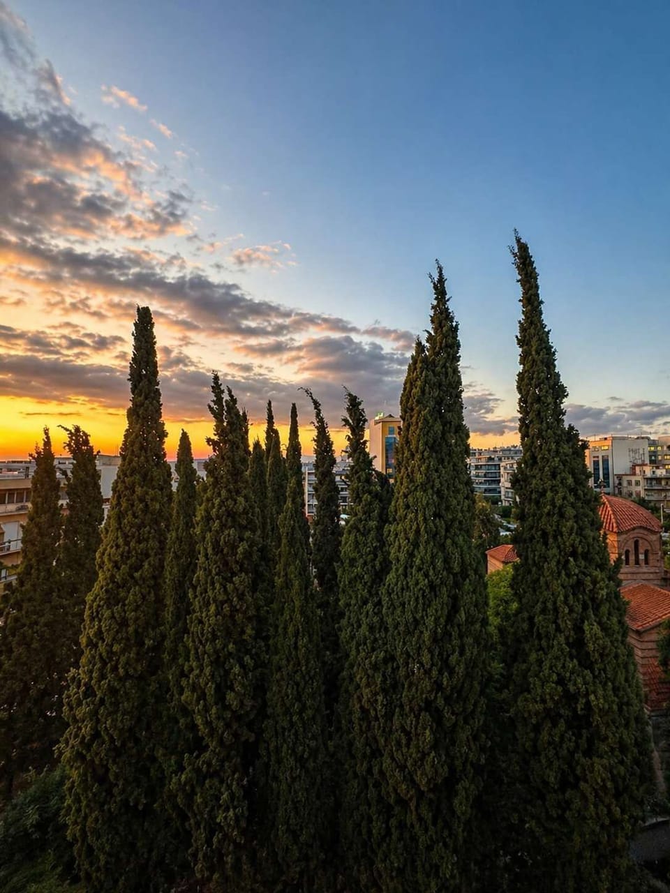 Sunset Over Athens with Peaceful Urban Views