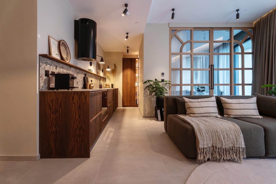 Cook, relax, and unwind in a space where modern design meets everyday comfort 