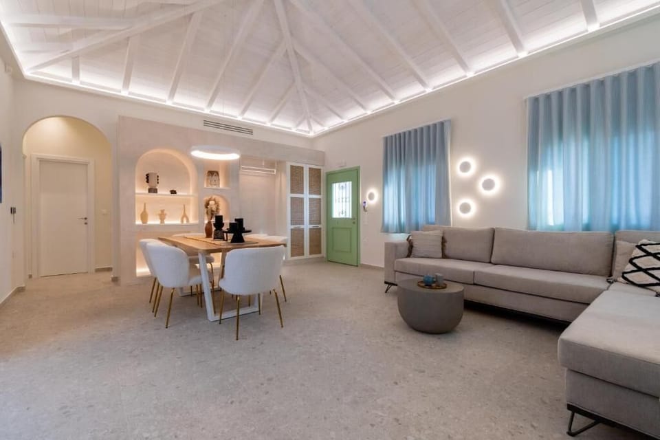 Stylish Living Room with Warm Lighting and Comfortable Seating