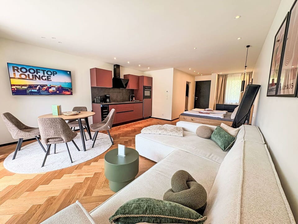 Furniture, Interior Design, Flooring, Floor, Wood, Couch, Living Room, Room, Apartment, Comfort