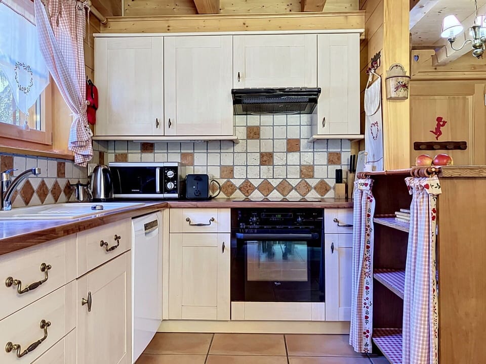 Kitchen, Wood, Interior Design, Cabinetry, Countertop, Kitchen Appliance, Flooring, Furniture, Major Appliance, Drawer