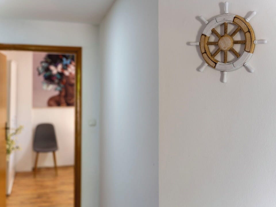 Interior Design, Flooring, Floor, Room, Wall Sticker, Paint, Hardwood, Natural Material, Wood Stain, Light Fixture