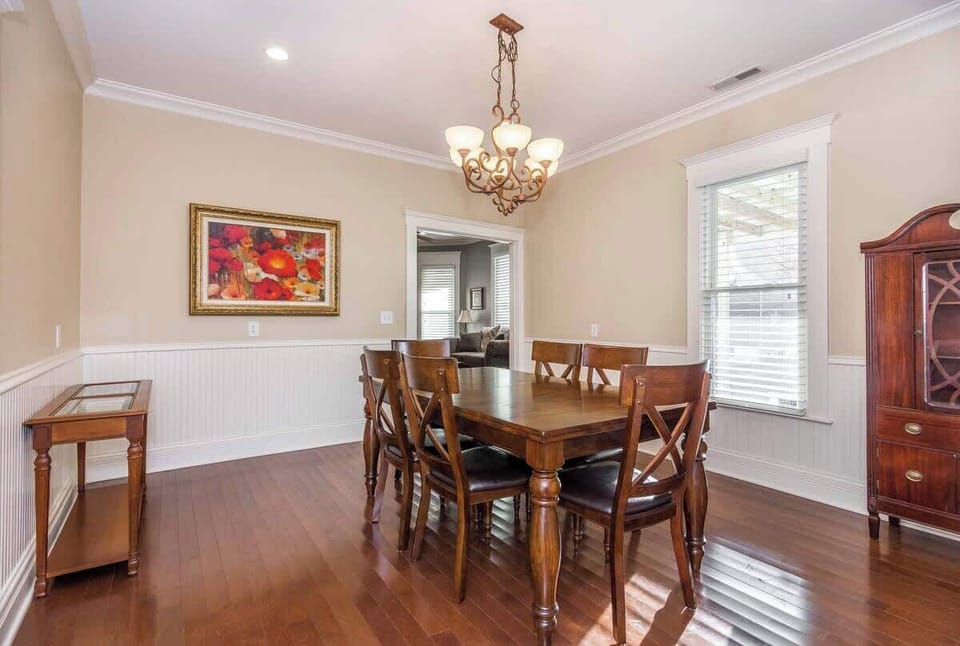 Dining Area: Cozy dining space featuring a modern table and chairs. Ideal for shared meals, casual dining, or planning your day over coffee.