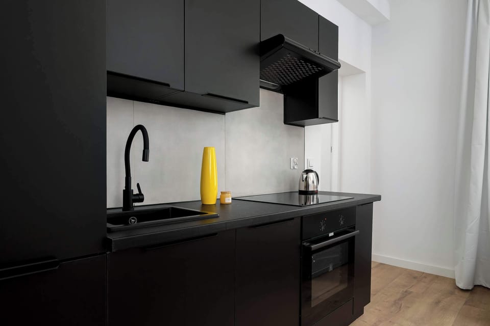 The fully equipped kitchenette includes everything you need for a home-cooked meal.