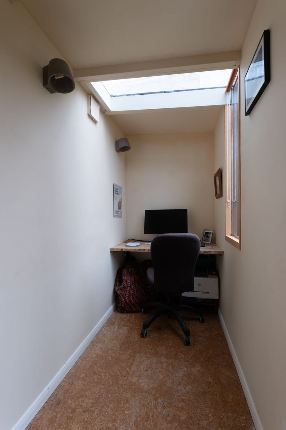 The garden room offers a desk with a monitor & printer, perfect for peaceful remote work
