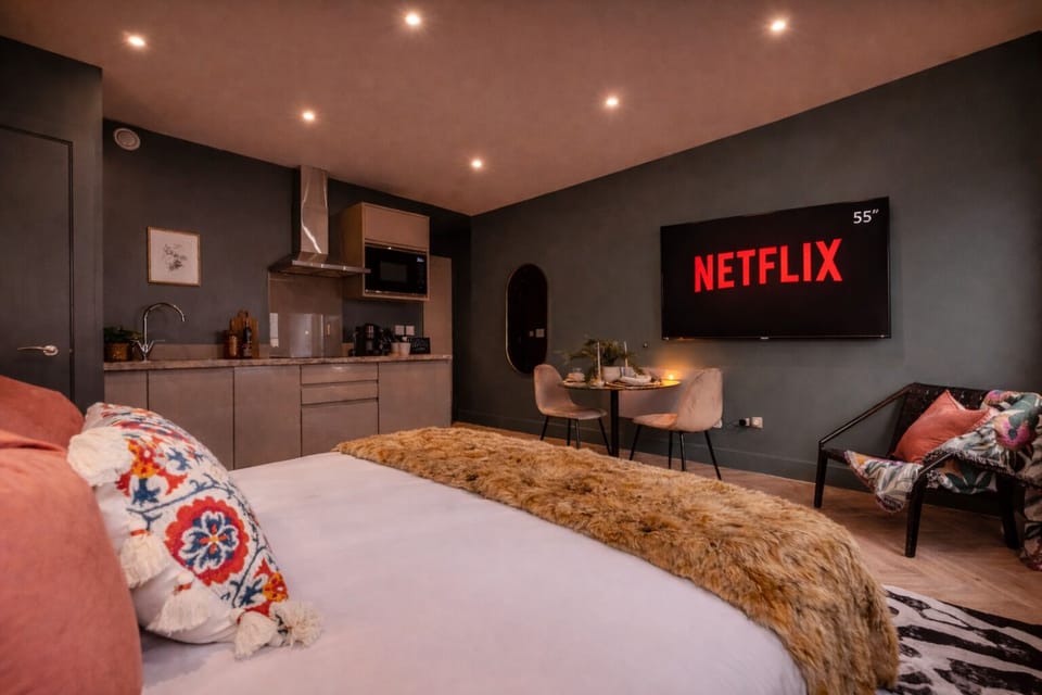 Relax with Netflix, Disney+, and streaming apps on the large Smart TV — ultrafast WiFi included for work or entertainment