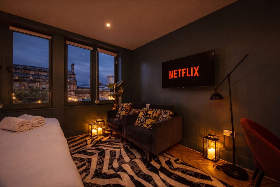 Relax with Netflix, Disney+, and streaming apps on the large Smart TV — ultrafast WiFi included for work or entertainment