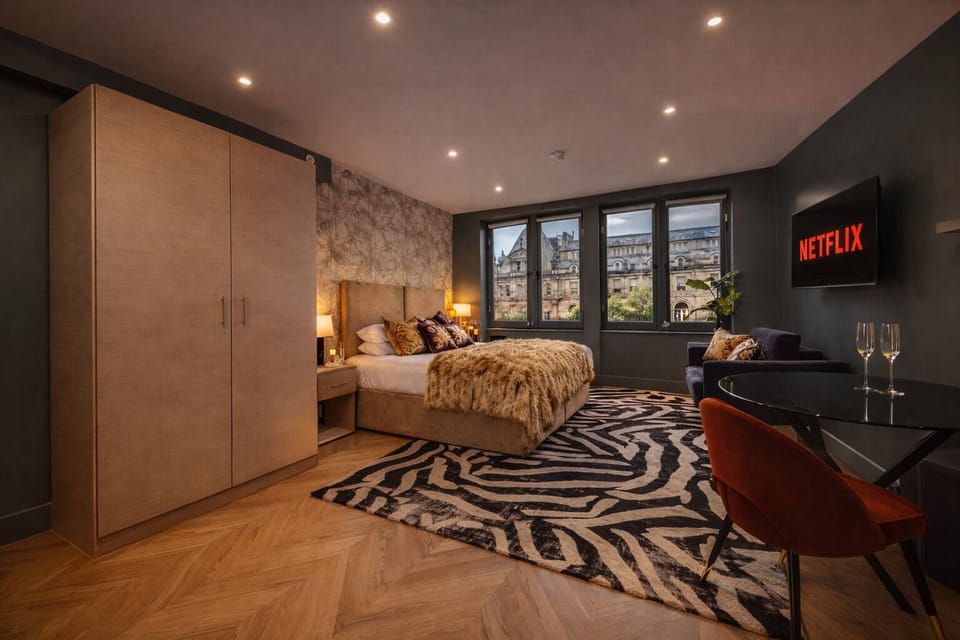 Relax with Netflix, Disney+, and streaming apps on the large Smart TV — ultrafast WiFi included for work or entertainment