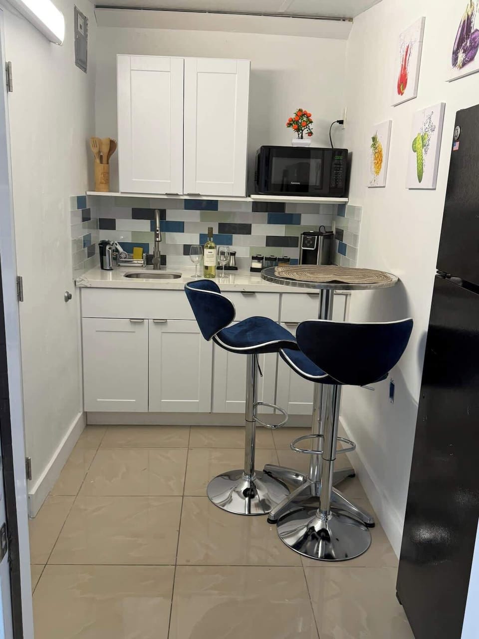 Compact kitchenette with essentials for easy meal prep and morning coffee.