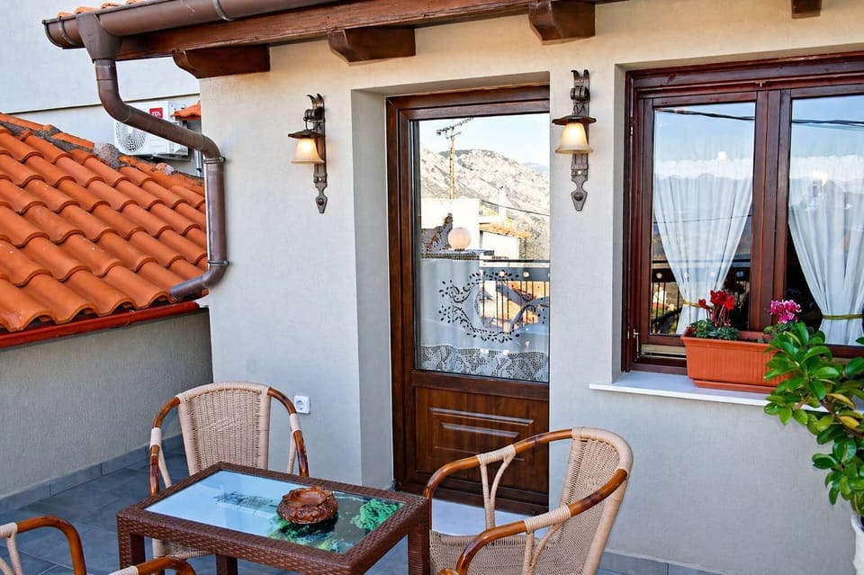 Charming balcony corner with seating and beautiful surroundings