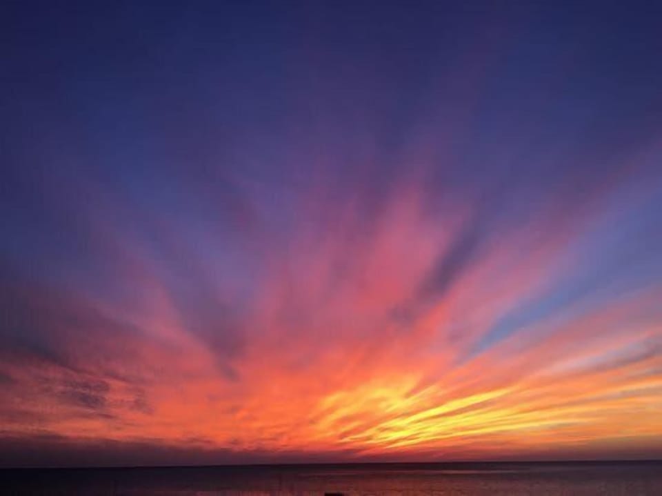 Catch stunning sunsets over the bay. Only 1 mile to Breakwater Beach