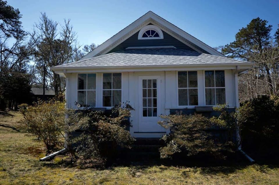 Bluebird Cottage from the front driveway and entrance to the right