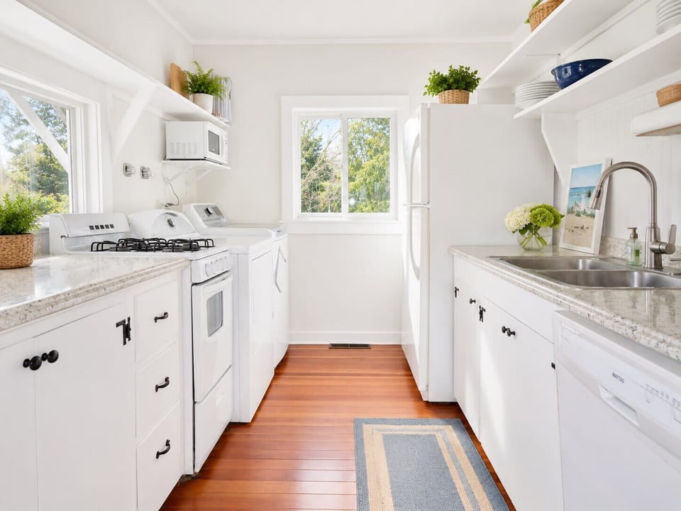 Updated and well-equipped kitchen with new counters and fresh paint