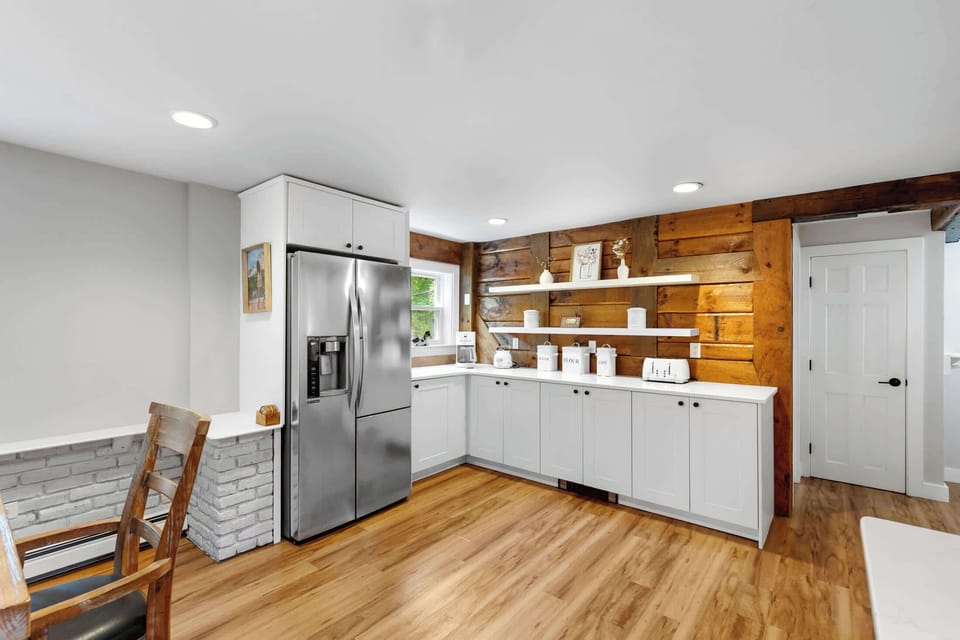 Additional kitchen storage and prep space make it easy to settle in for family meals and longer Cape stays.