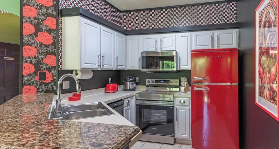 Enjoy quality time in this stylish kitchen, where every meal becomes a fun and memorable experience with your loved ones.