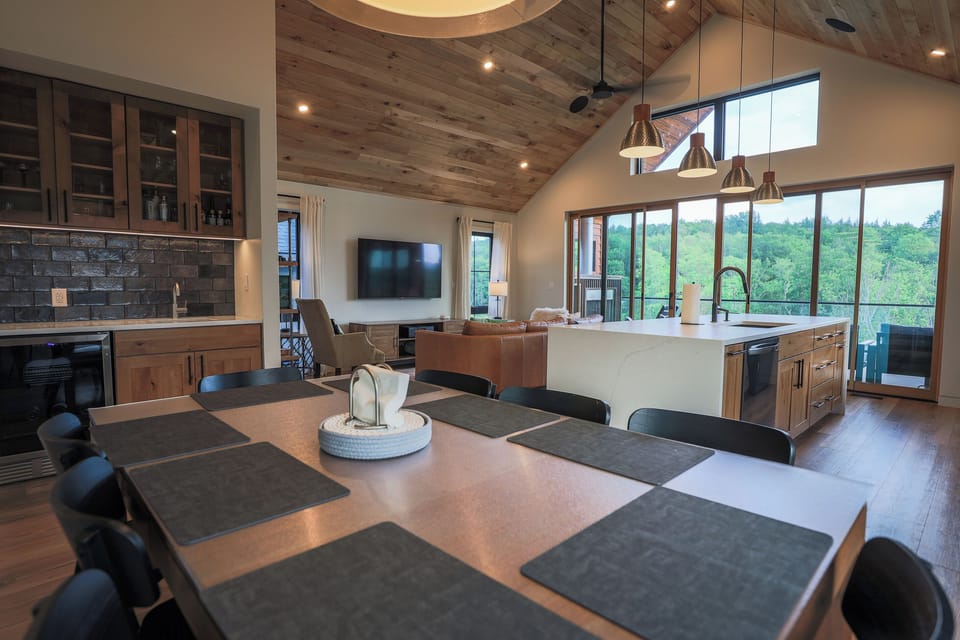 Dining for 8 expands to 10 with leaf. Two extra chairs in Rec Room.