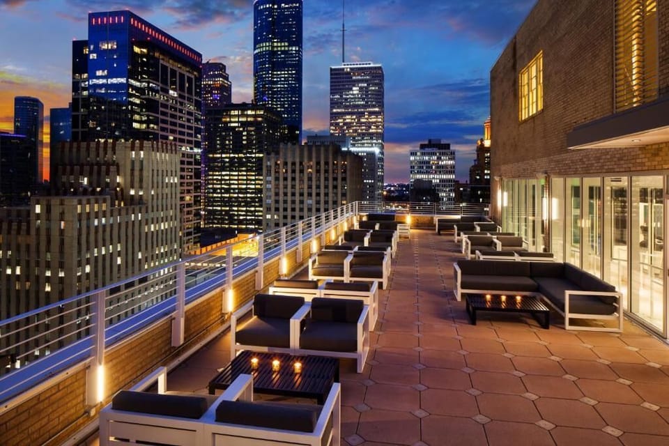 Unwind at sunset on the rooftop with sweeping skyline views.
