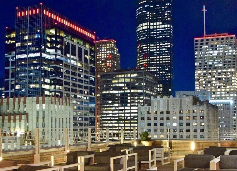 Unwind under city lights from a stylish rooftop lounge.