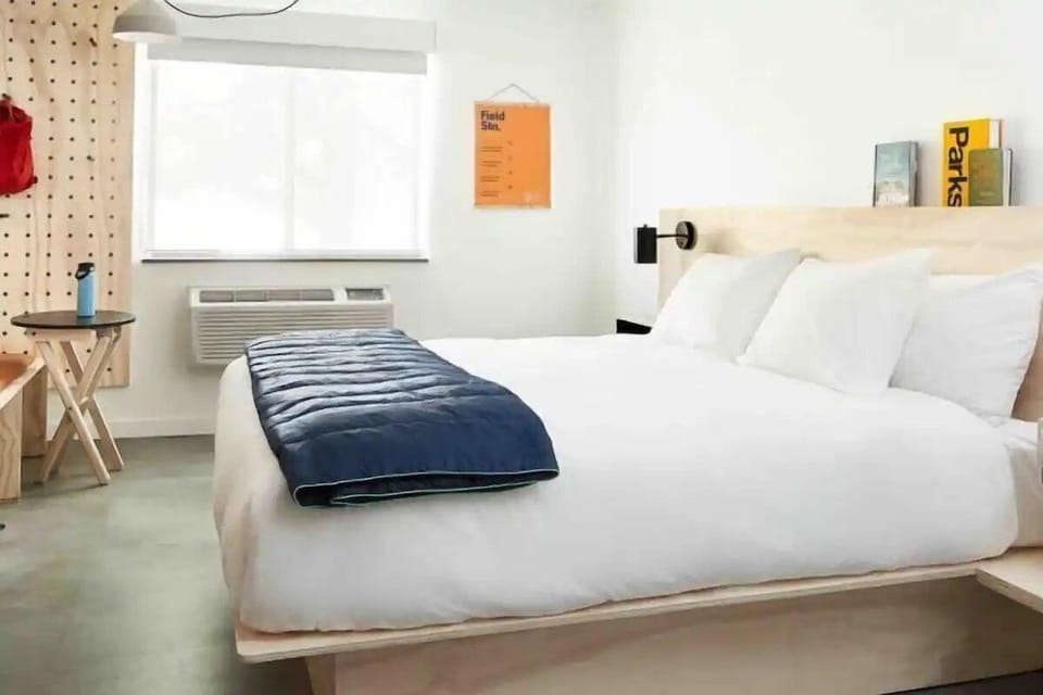 Sink into a sunlit bed for restorative, quiet sleep.
