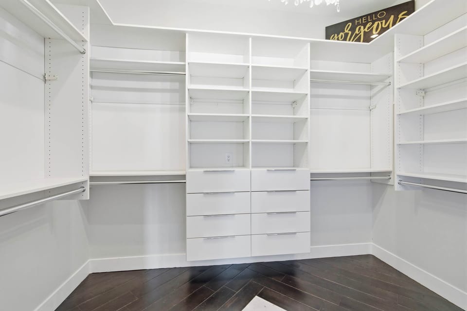 Keep clothes & bags tucked away in the king suite’s massive closet​