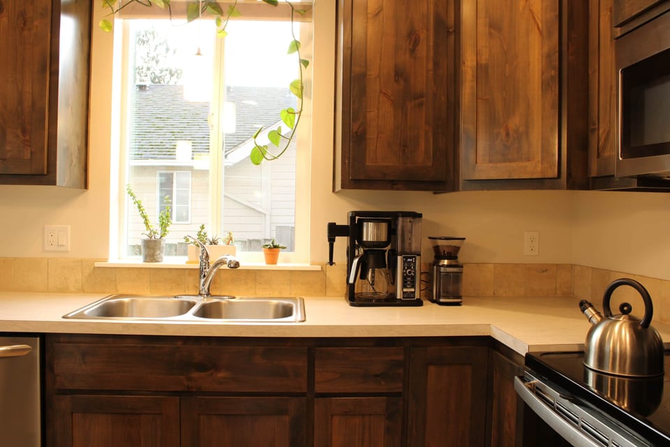 Kickstart your mornings with our premium Ninja specialty coffee maker and burr grinder.