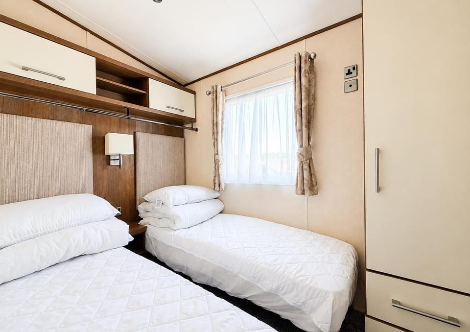 The twin room is the perfect place to relax after a busy day on the beach. The kids will love having their own space to relax and get a good nights sleep.