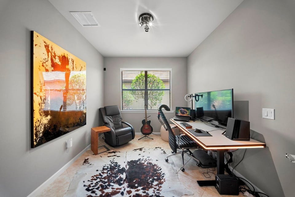 Make yourself at home - Enjoy the massaging Chair in the Den