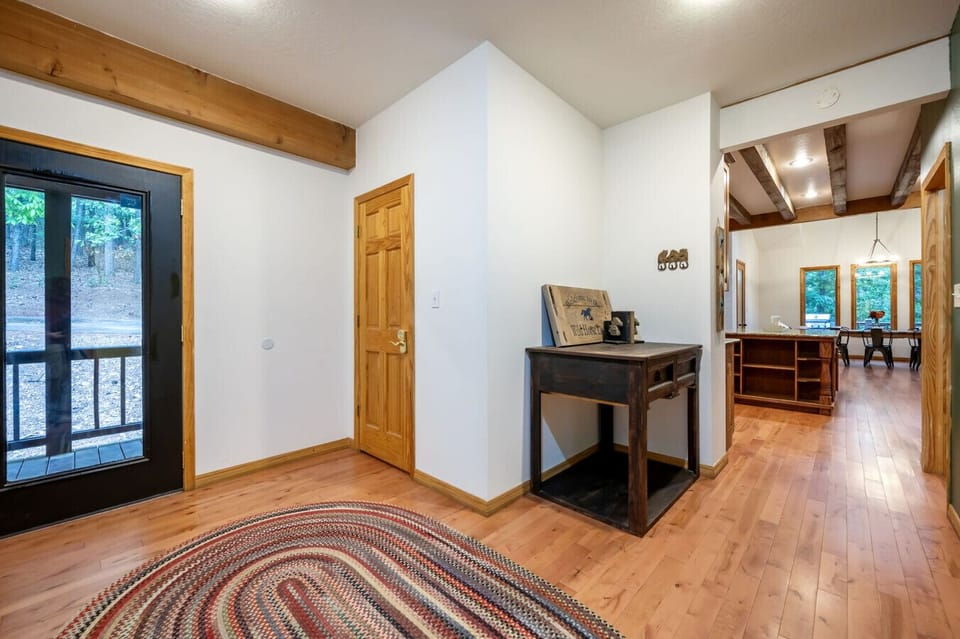 The inviting entryway sets a rustic and welcoming tone for the whole lodge.