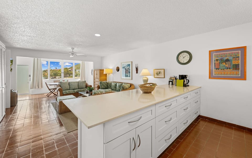The kitchen with the large island will definitely be a place your group will congregate around.