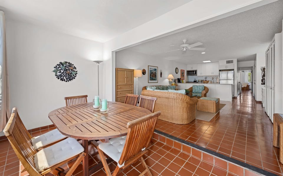 Open concept living and dining space allows the natural light to flow throughout.