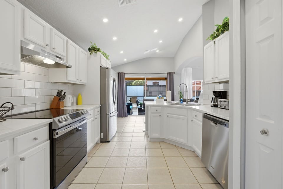 Cook, snack, or sip your morning coffee at the spacious breakfast bar with seating for the whole crew.
