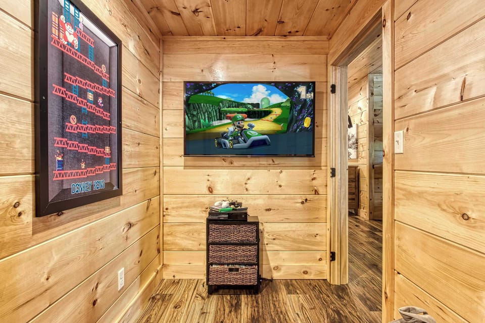 This arcade nook is the perfect hangout for younger guests.