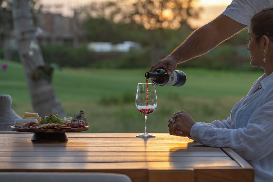 Poolside wine and snacks make outdoor dining feel easy and special