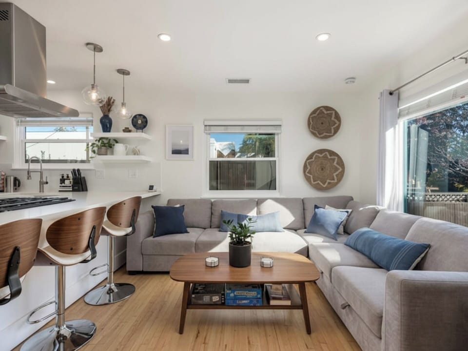 Gather with loved ones in this bright, open-concept living space,