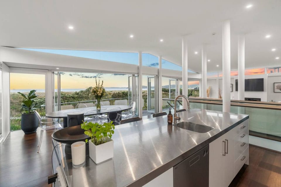 Fully equipped kitchen with stunning views over the ocean and sand dunes