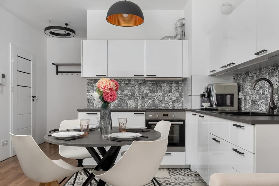 The fully equipped kitchenette includes everything you need for a home-cooked meal.